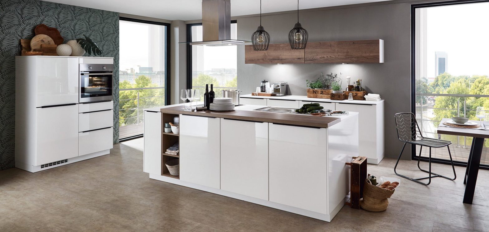 Kitchen cabinets arranged around a cooking area