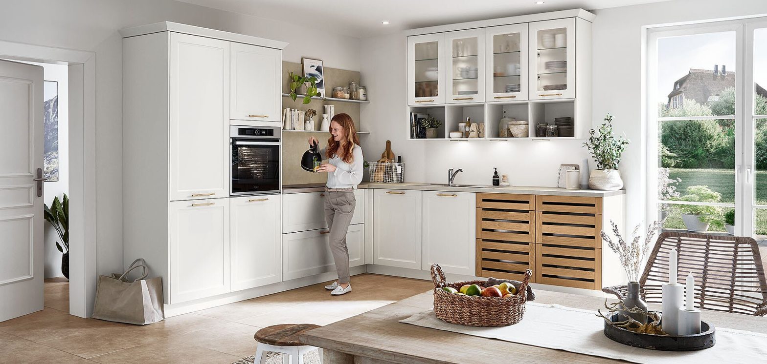 White cabinetry with contrasting kitchen island