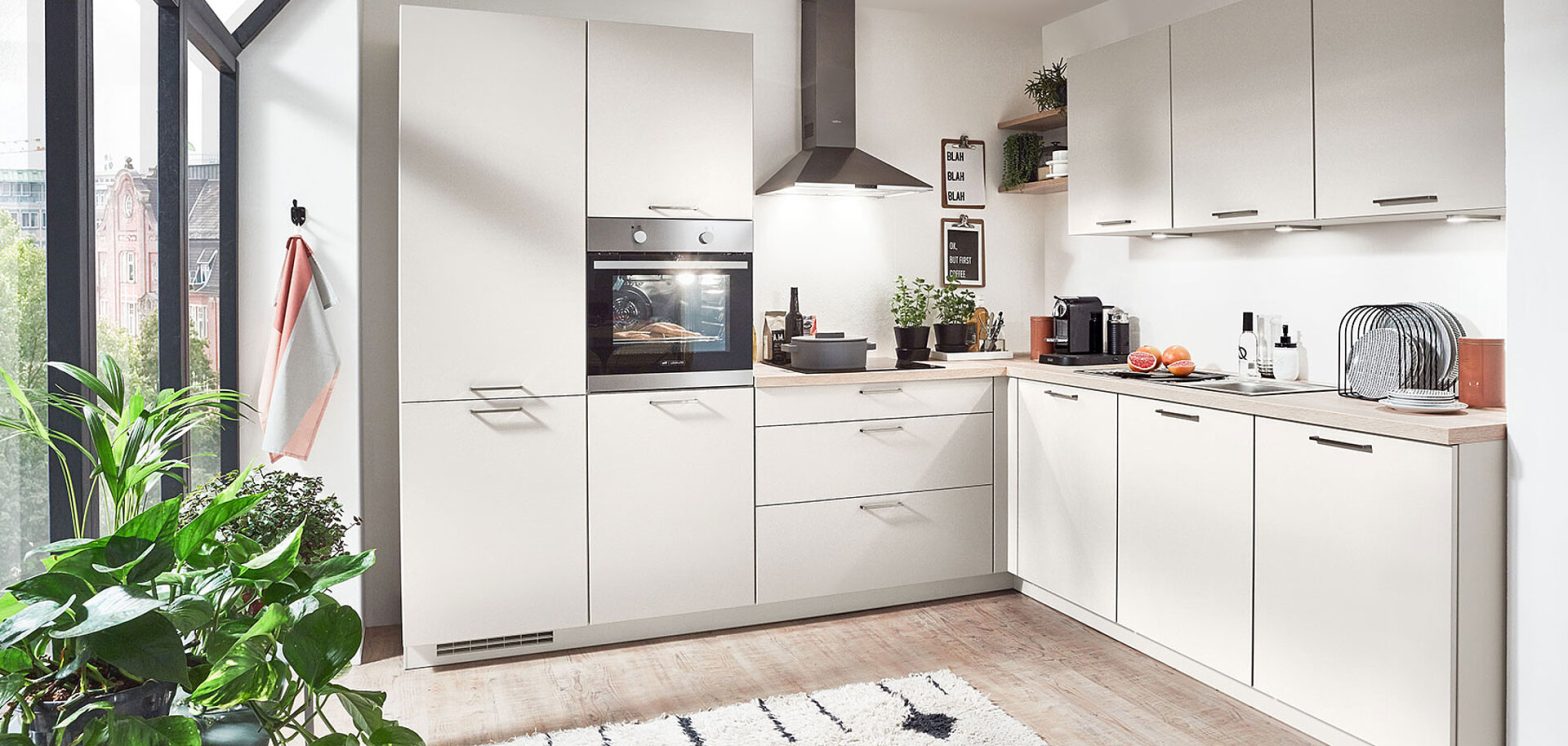 Contemporary kitchen cabinets with concealed appliances