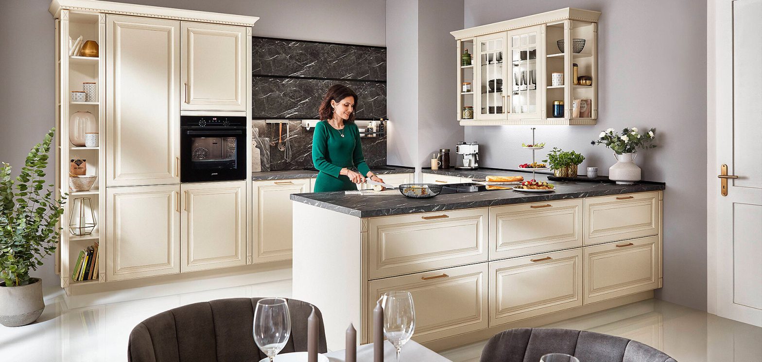 White kitchen cabinets with simple modern handles