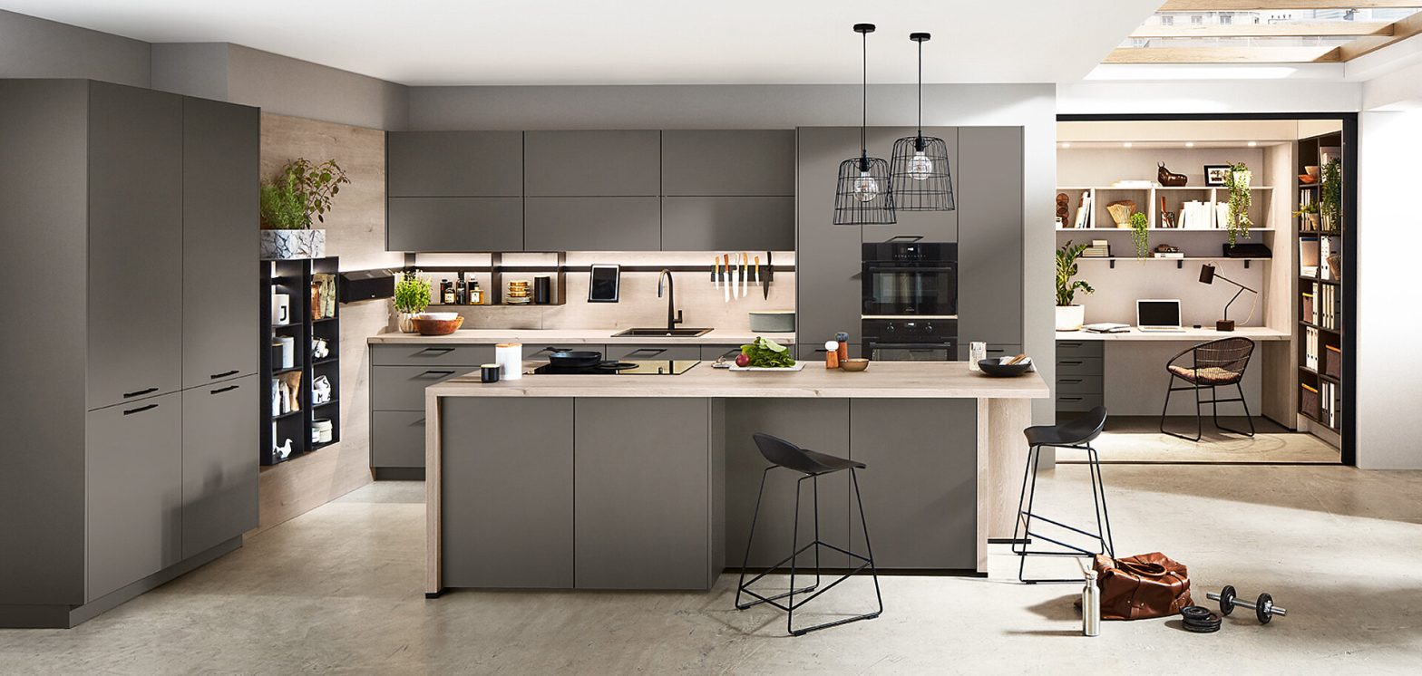 Custom cabinetry designed around kitchen appliances
