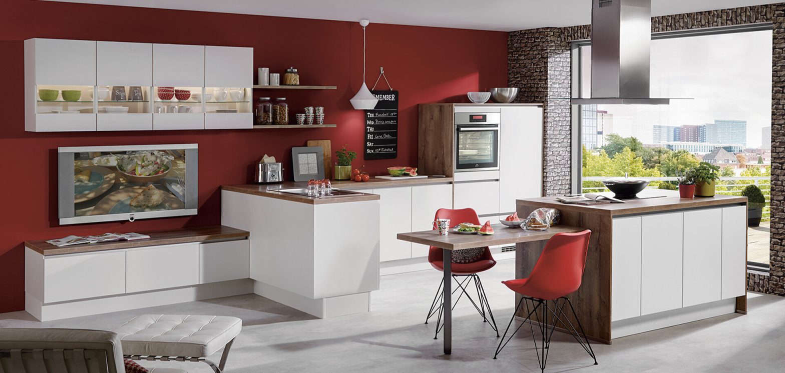 Red and white kitchen furniture with modern design and stylish finishes