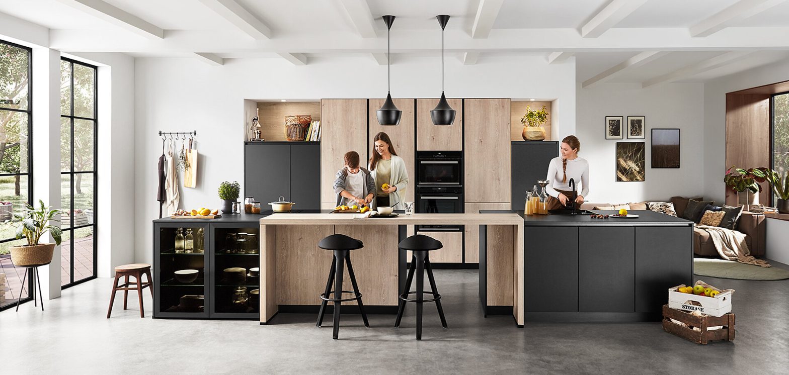 Wood kitchen cabinetry with a large island