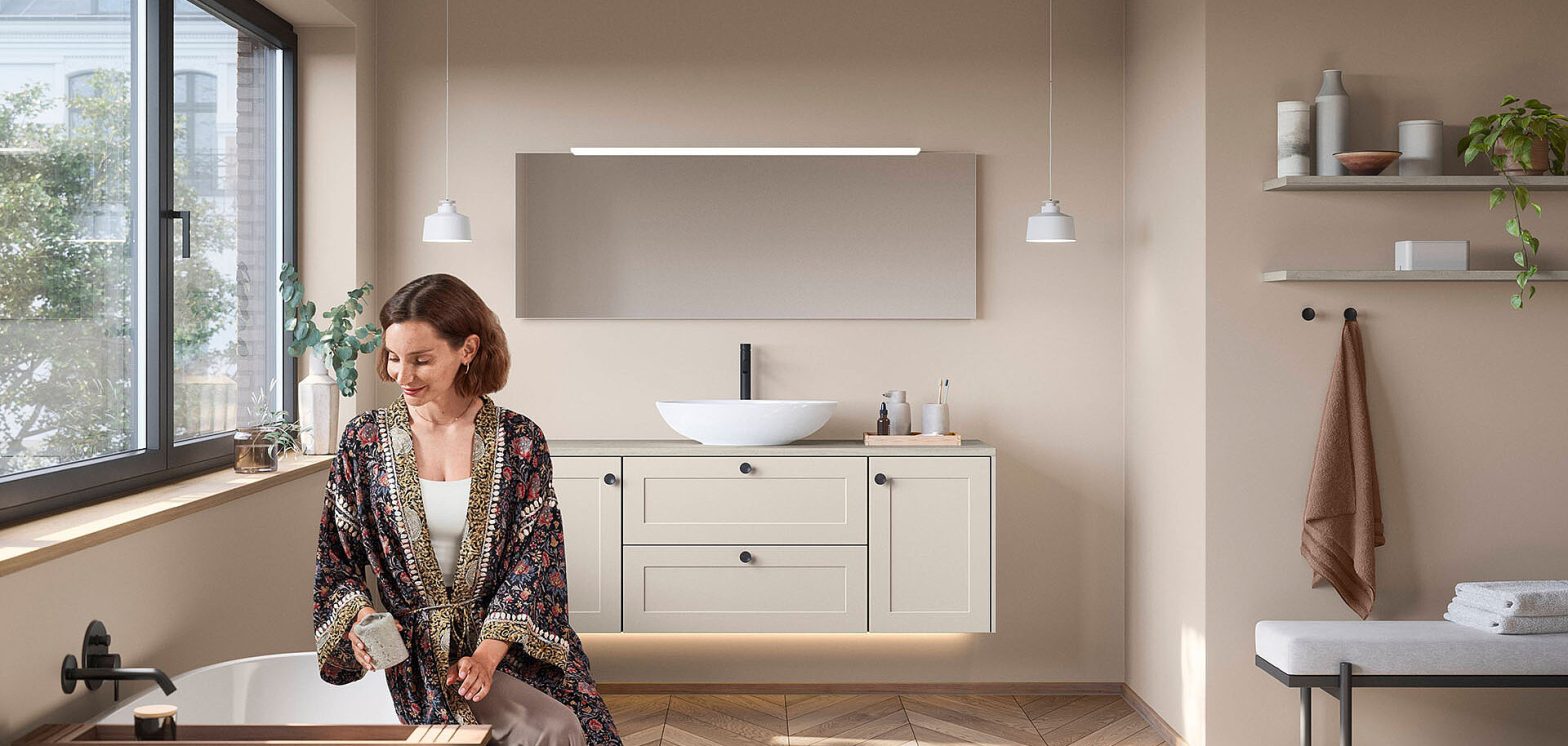 Bathroom vanity cabinet beneath countertop basin