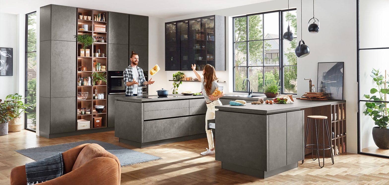 Sleek cabinets with built-in cooking appliances